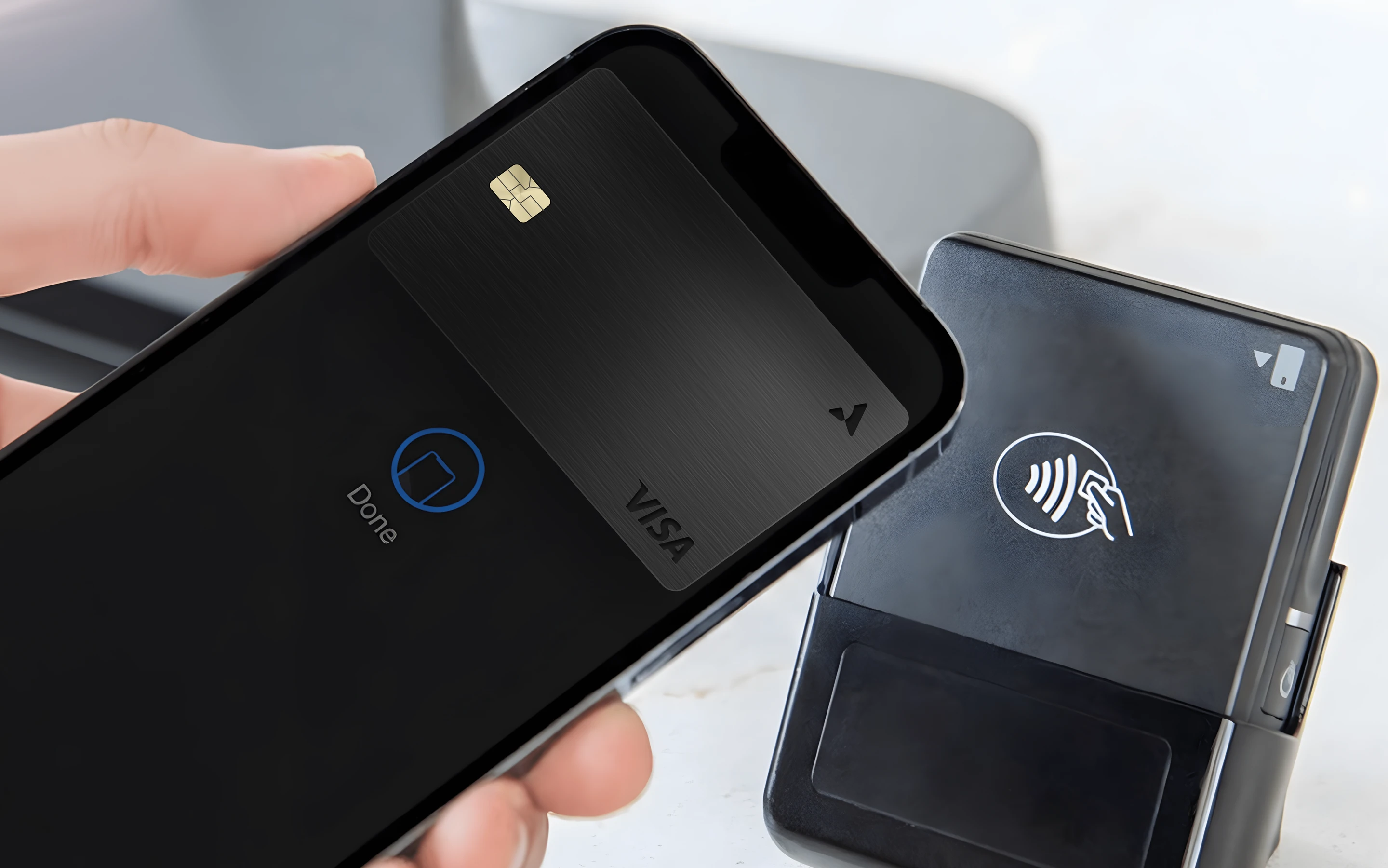 An Avior card tapped against a reader.